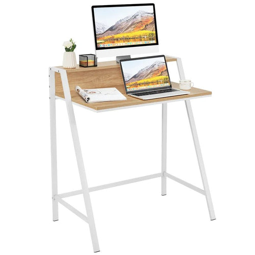 Modern computer desk with wood top, white metal frame, monitor, laptop, and accessories