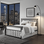 Modern black metal bed frame with white bedding in a contemporary bedroom, city view windows
