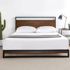 Modern wooden and metal bed frame with white bedding in a minimalist bedroom