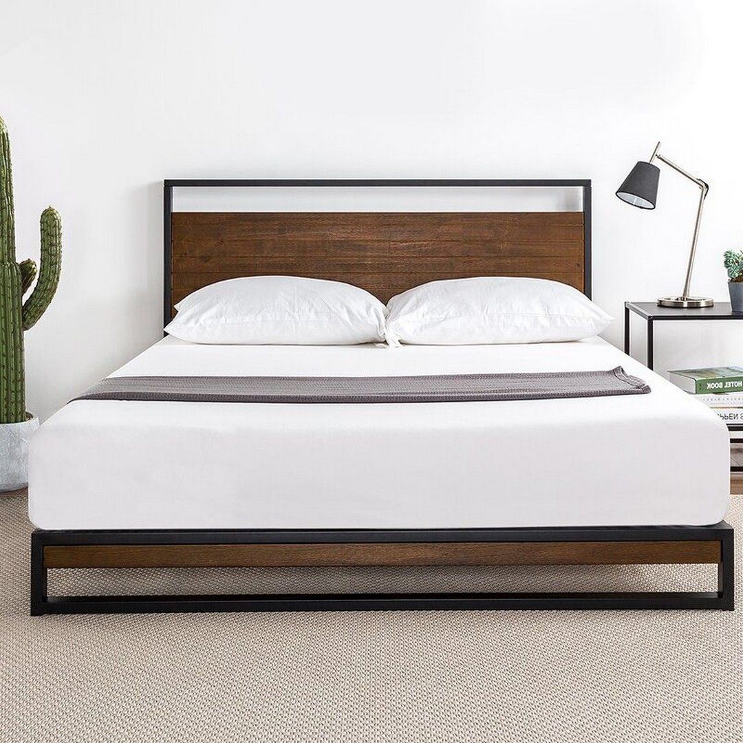 Modern wooden and metal bed frame with white bedding in a minimalist bedroom