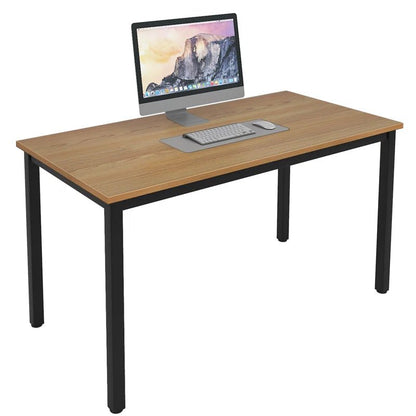 Modern wooden desk with black metal legs, computer monitor, keyboard, and mouse