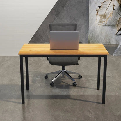 Modern wooden office desk with black metal legs and gray ergonomic chair in workspace