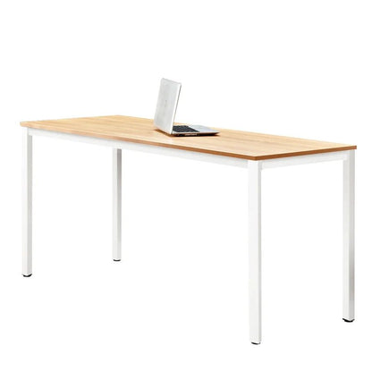 Modern rectangular wooden desk with white metal legs and a laptop on top, minimalist design