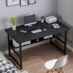 Modern black steel office desk with shelf, ideal for home workspace or study area