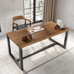 Modern black and brown desk with metal legs in stylish home office setting
