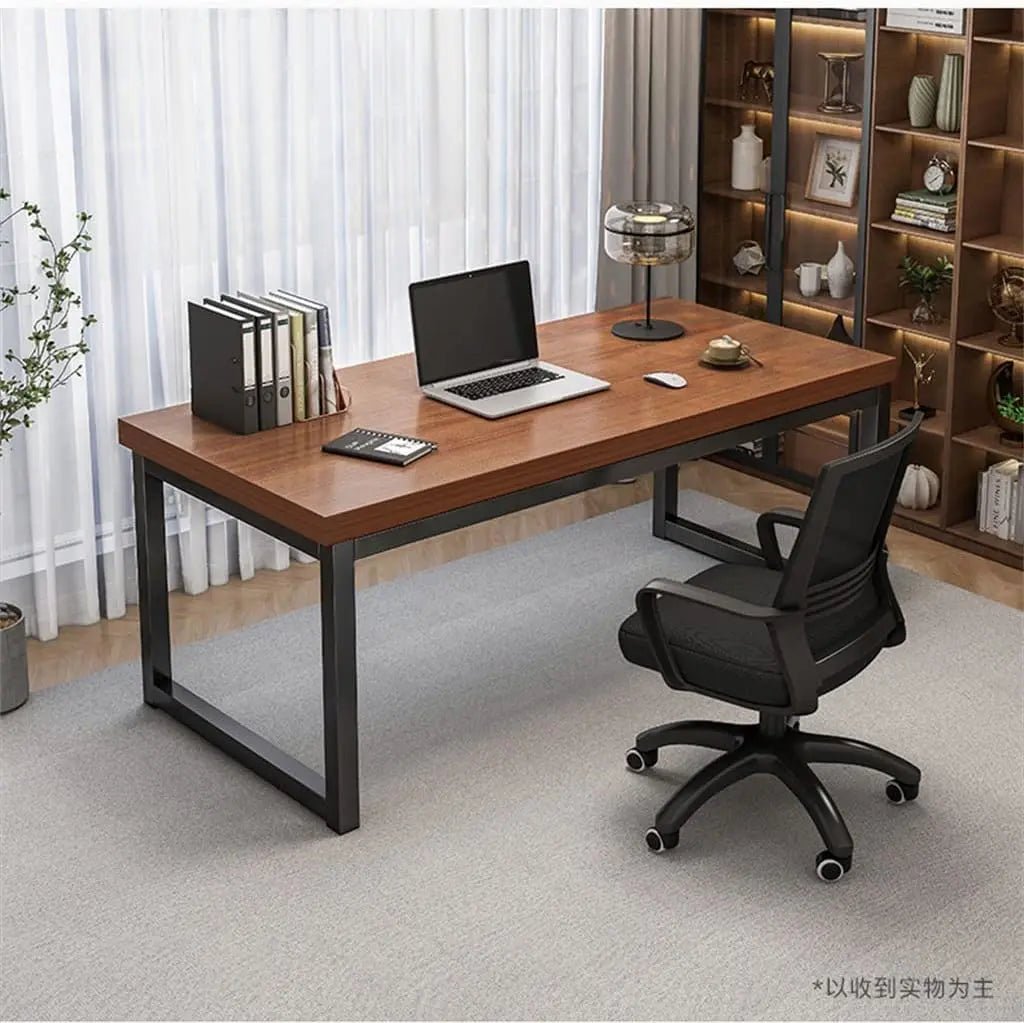 Modern black and brown office desk with metal legs in a home workspace setting
