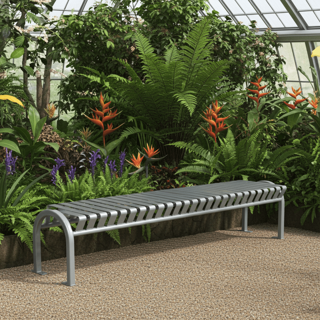Heavy-duty metal backless bench in a garden setting with lush green plants and flowers