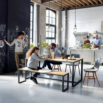 Solid oak dining bench with metal frame in modern open kitchen and dining area, people around table