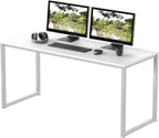 Modern white office desk with metal legs, dual monitors, keyboard, and accessories