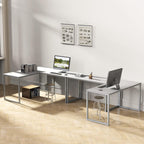 Modern L-shaped office desk with metal frame, stools, computers, and wall art in a bright workspace