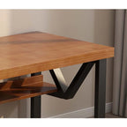 Modern double-layer computer desk with wood top and black metal frame in home setting