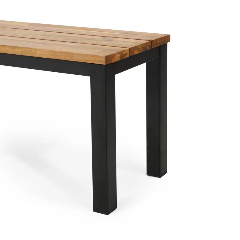 Modern outdoor bench with a slatted wood seat and black metal legs