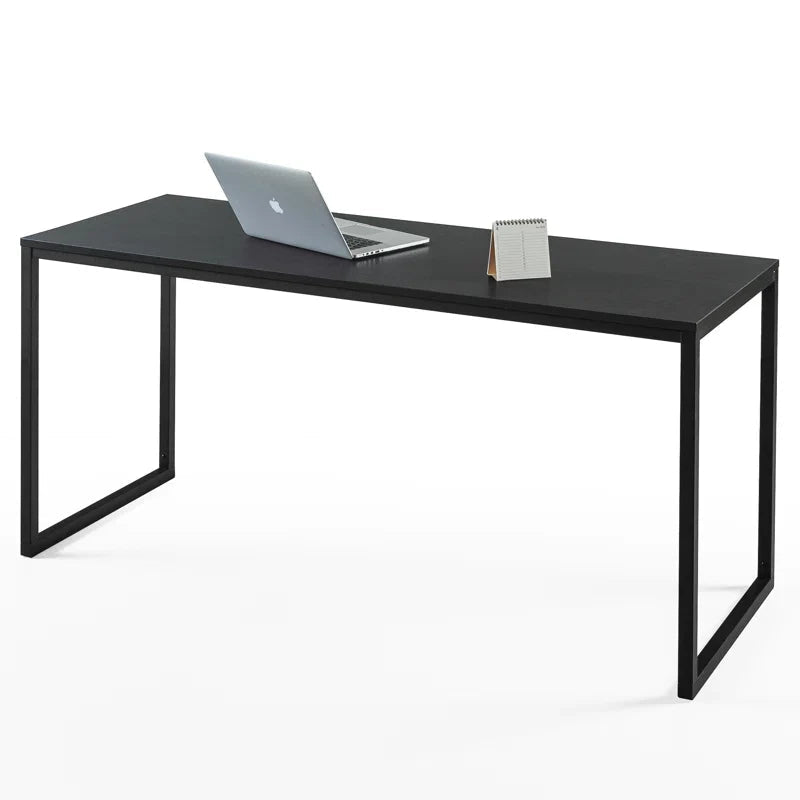 Modern black desk with minimalist metal frame, laptop and notepad on desktop