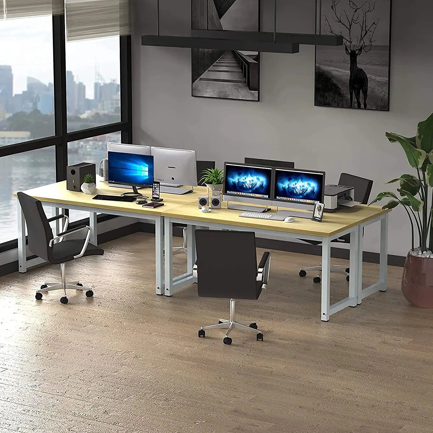Modern metal office desk 120x60 cm with computer chairs in a bright workspace