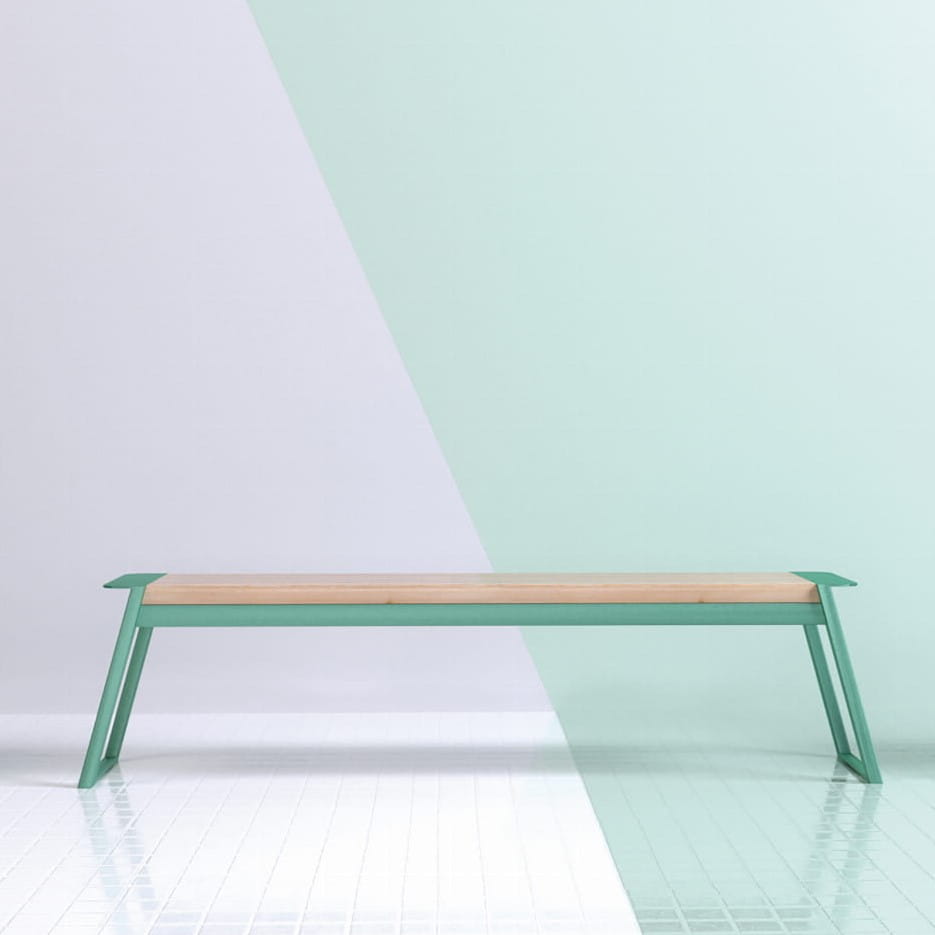 Modern backless three-seater bench with green metal frame and wooden seat on tiled floor