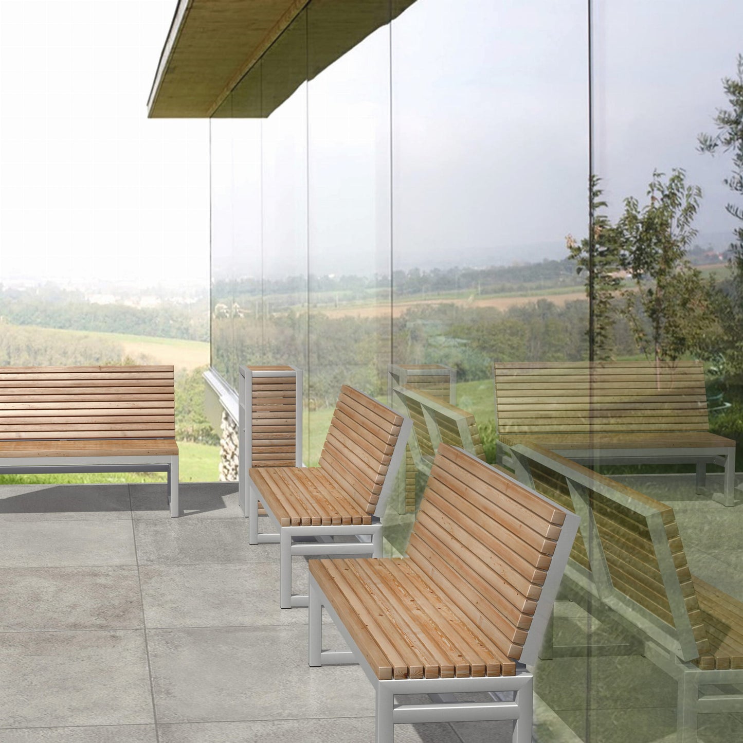 Modern outdoor three-seater wooden benches with backrests on a patio overlooking greenery