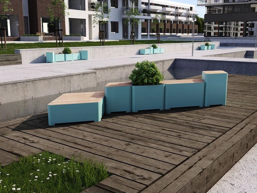 Modern outdoor aqua modular bench with built-in planters on a wooden patio in urban setting