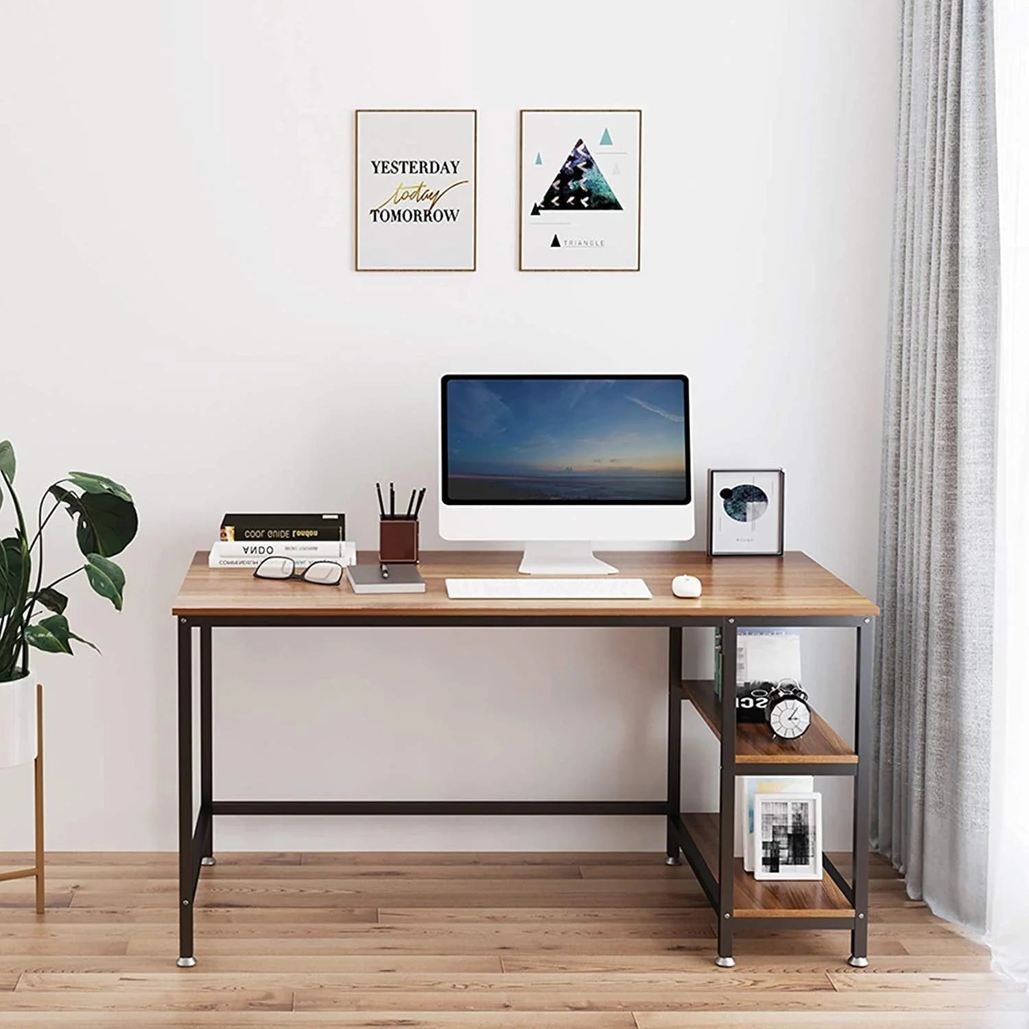 Modern wood and metal office desk with shelves, styled with computer and decor for home workspace