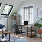 Industrial steel and wood office desk with shelving, modern home workspace setup