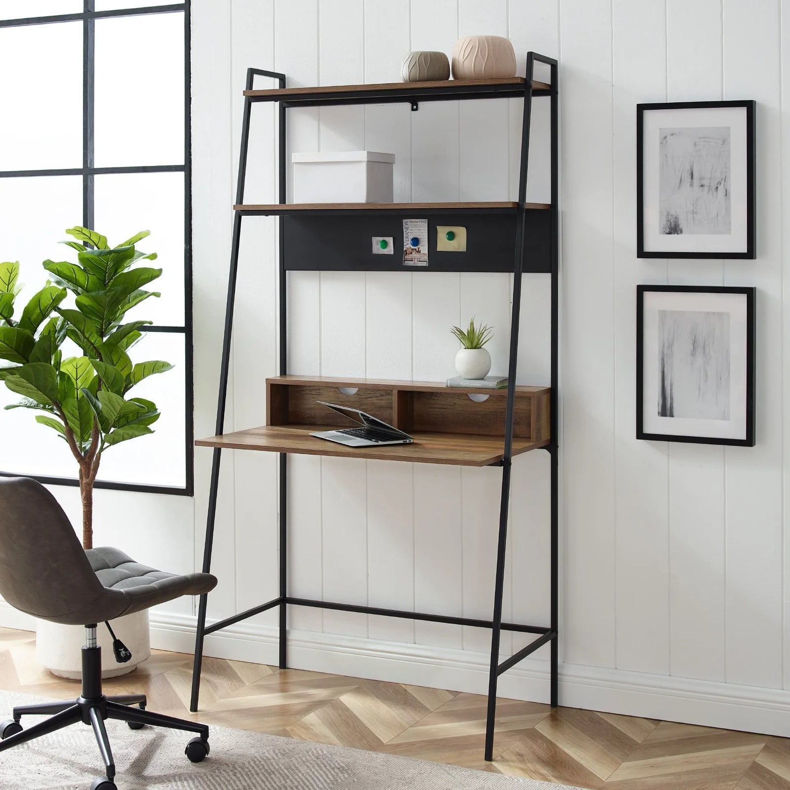 Ladder desk with wood shelves and metal frame in modern home office setting