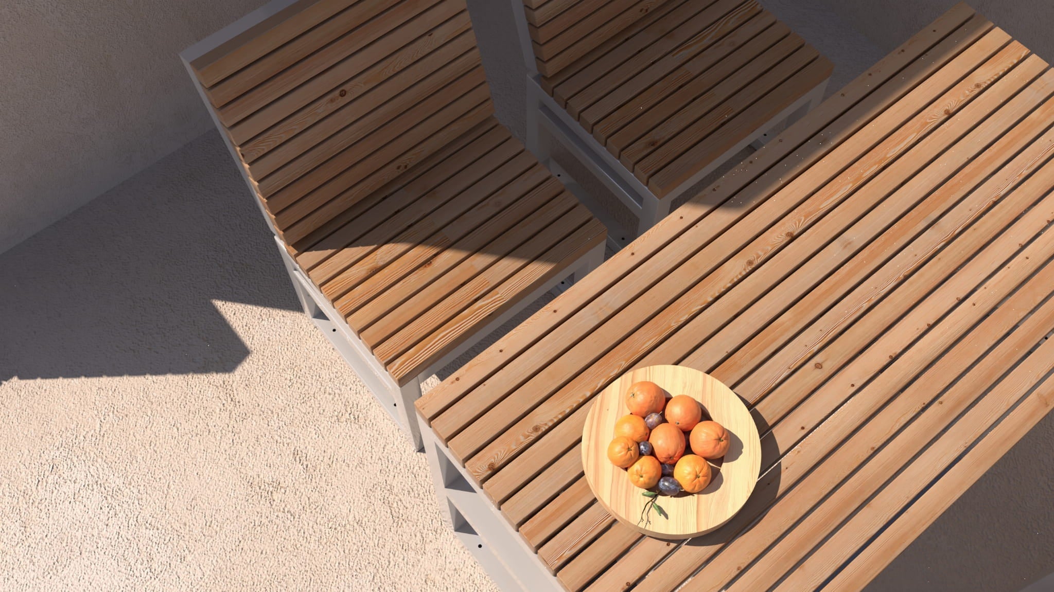 Modern outdoor wooden table with matching chairs, set for 4-6, with a fruit tray centerpiece.