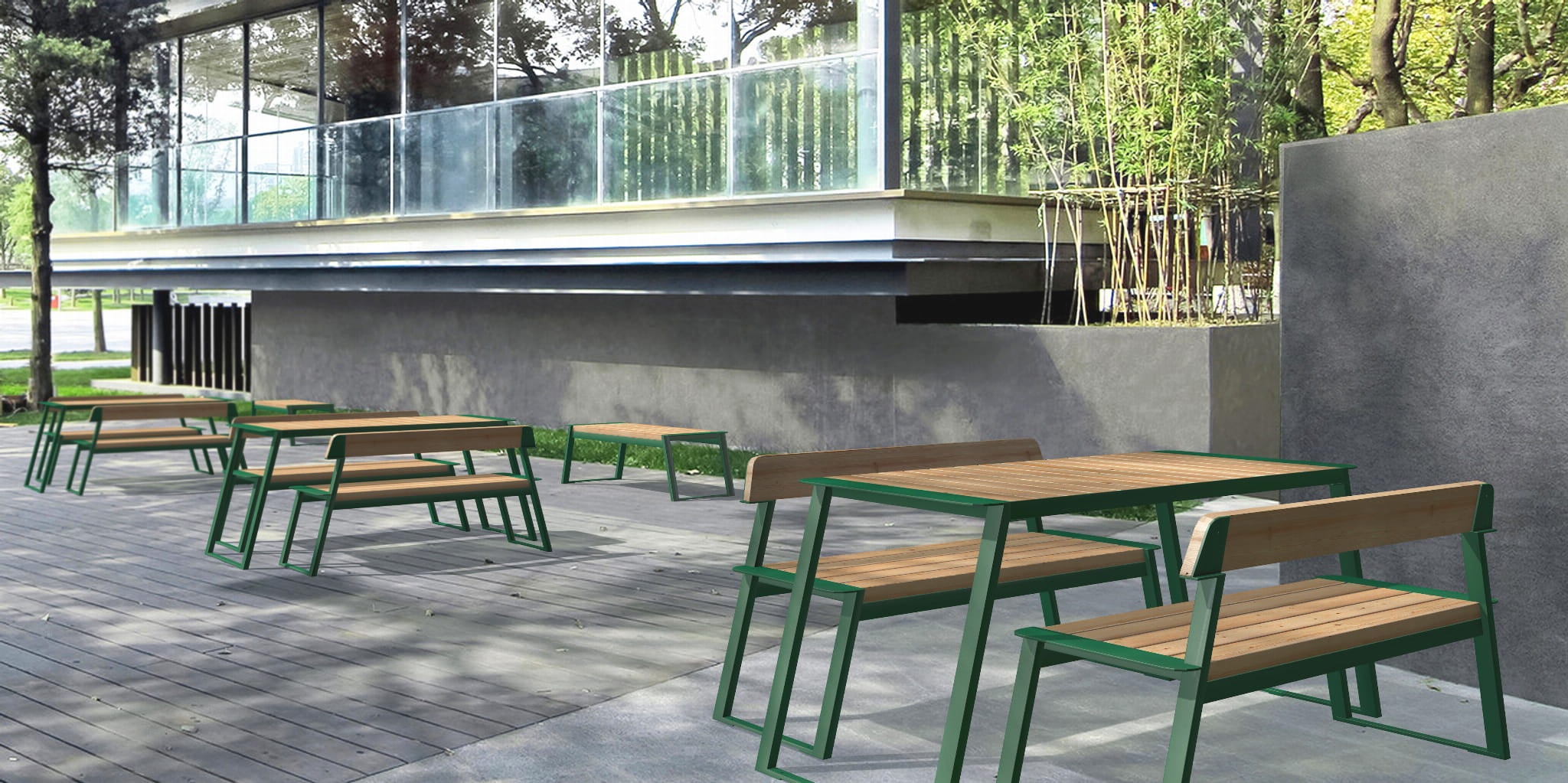Outdoor wooden table with green metal frame and benches on patio seating 4 to 6 people