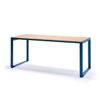 Modern outdoor dining table with wooden top and blue metal legs, seats 6 to 8 people