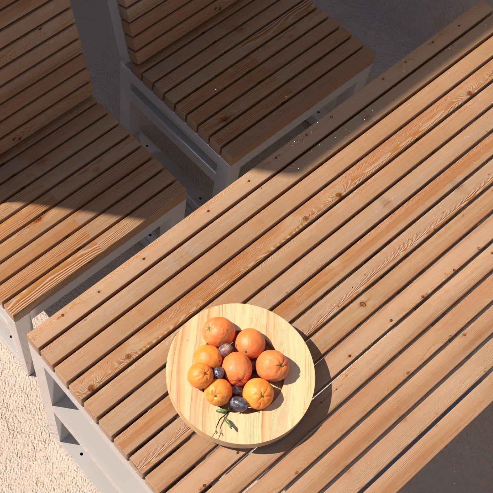 Outdoor wooden table with matching benches and a fruit plate in natural sunlight
