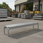 Modern metal bench for outdoor seating in an industrial warehouse yard